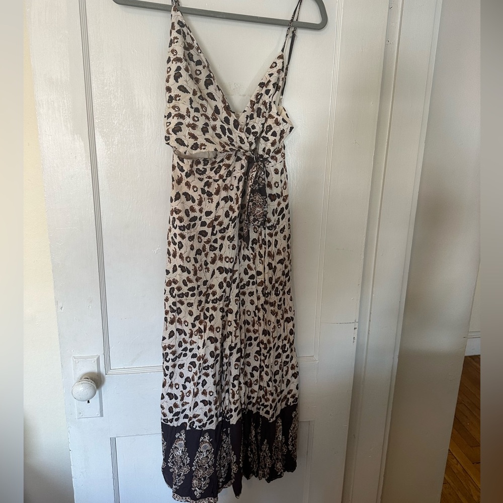 Women’s size medium wrap jumpsuit, Saints and Secrets